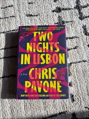 Two Nights in Lisbon by Chris Pavone - Bold Pink & Yellow Cover